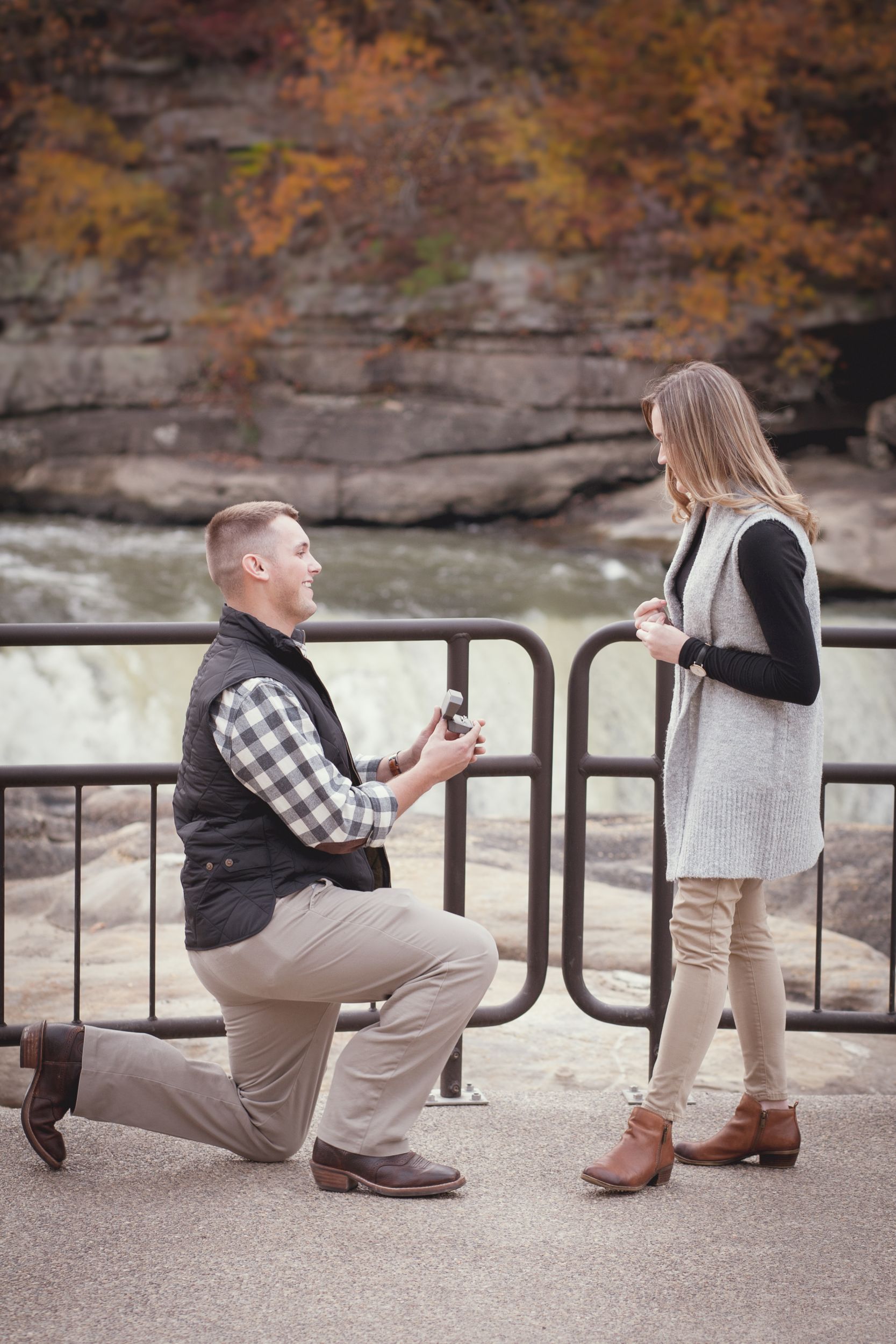 Fiancee and Fiance portrait at Cumberland Falls, Kentucky engagement by Fade To Blaq Photography