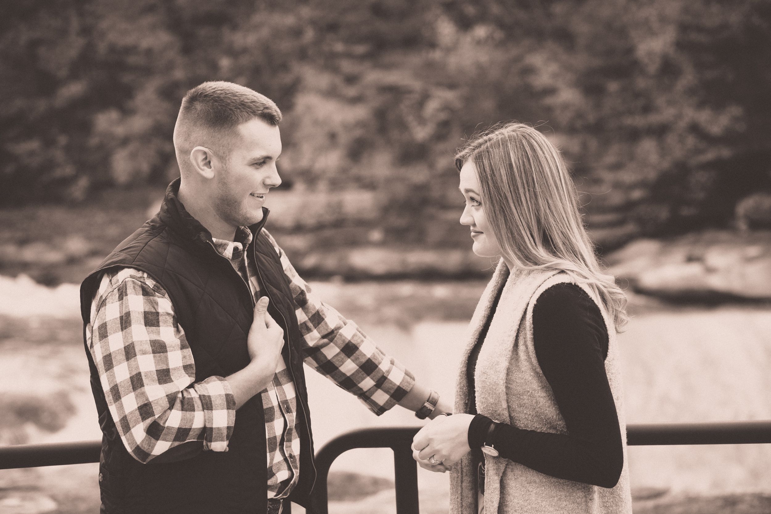 Fiancee and Fiance portrait at Cumberland Falls, Kentucky engagement by Fade To Blaq Photography