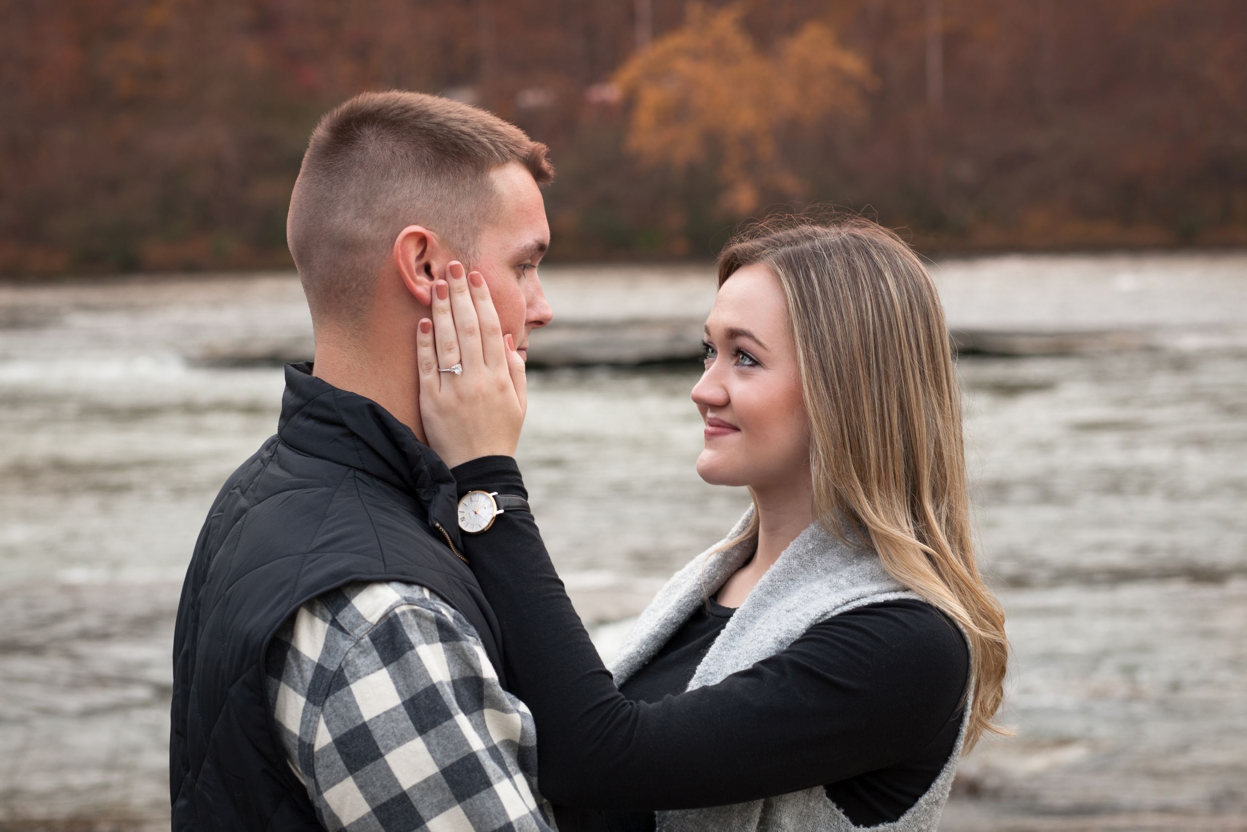 Fiancee and Fiance portrait at Cumberland Falls, Kentucky engagement by Fade To Blaq Photography