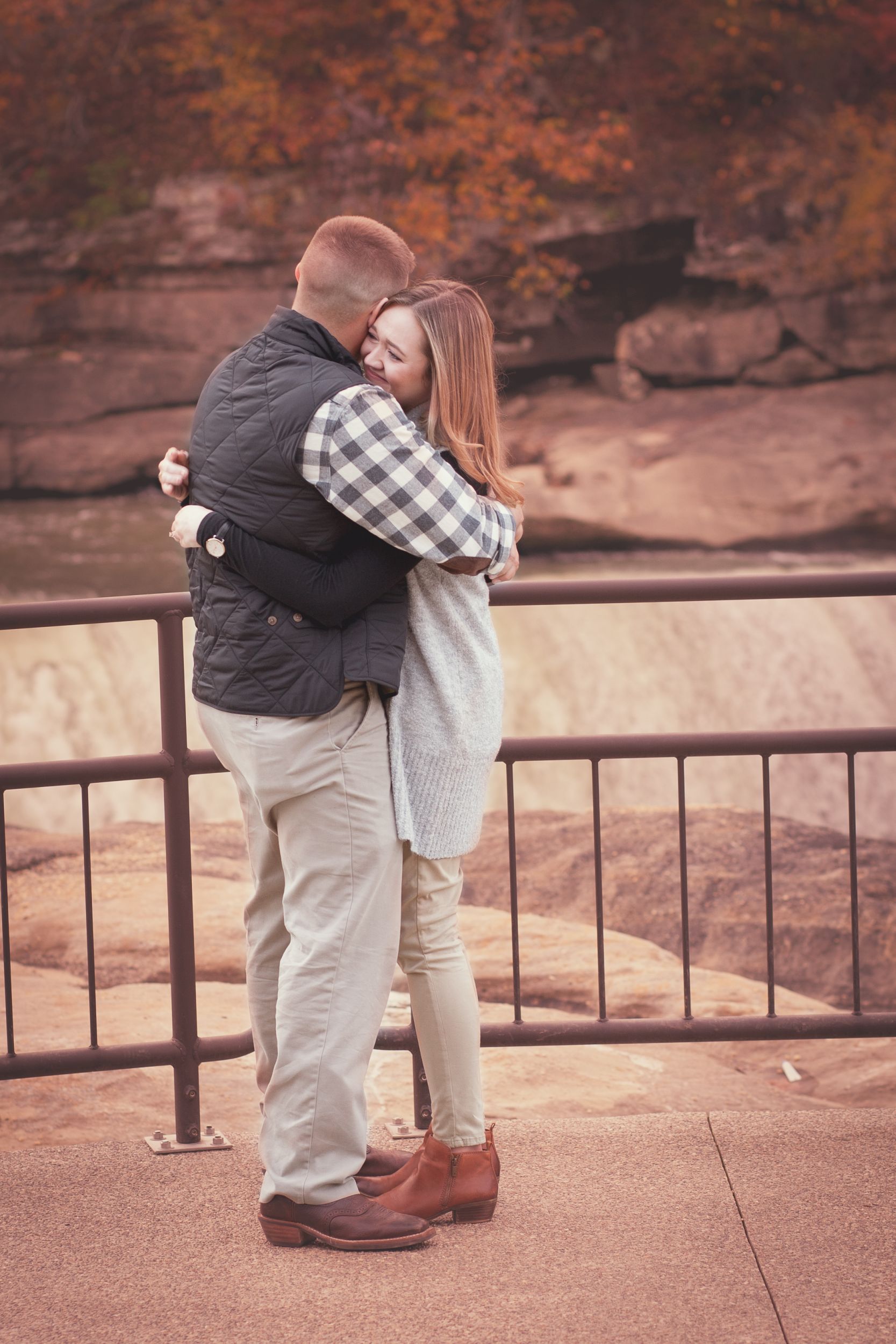 Fiancee and Fiance portrait at Cumberland Falls, Kentucky engagement by Fade To Blaq Photography